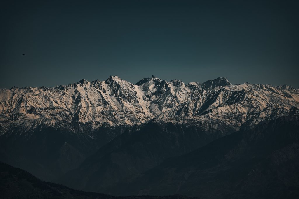 Himalayan mountain range landscape with snow peaks.